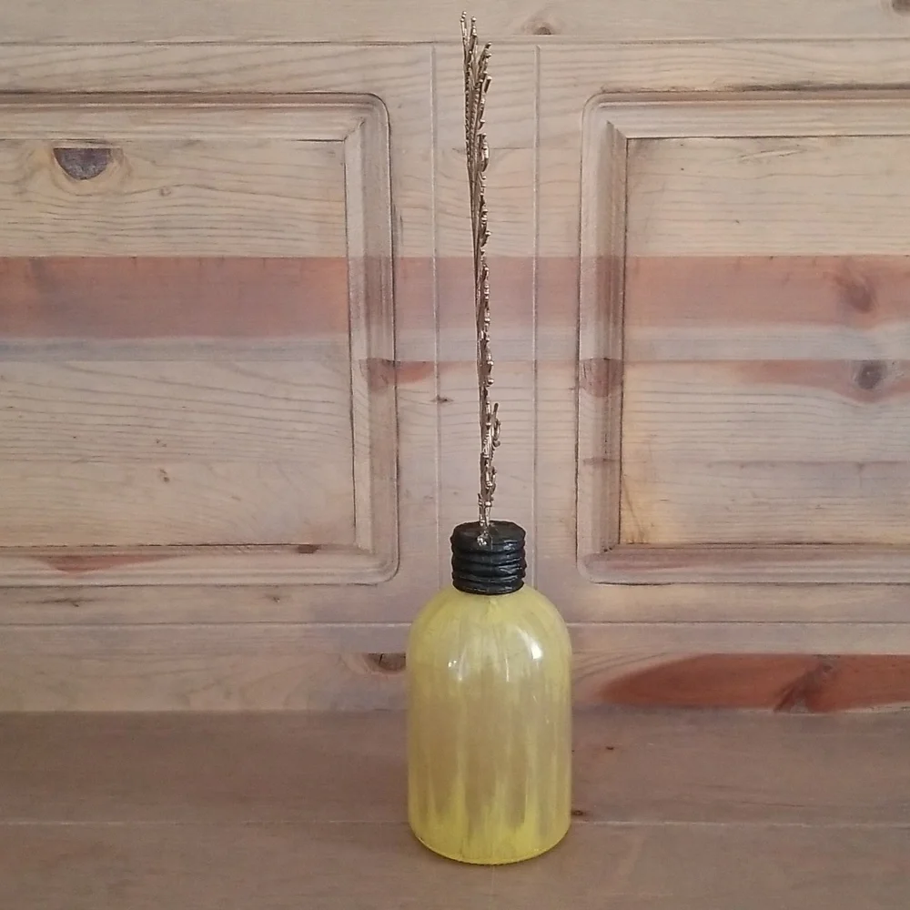 Pottery Barn painted bottle with plume finial